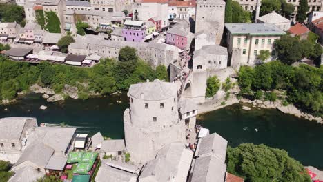 Aerial-Overhead-View-Of-Mostar-Bridge-With-River-Neretva-Running-Underneath