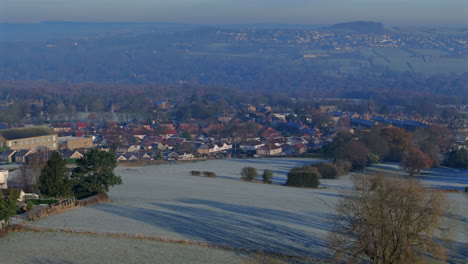 Establishing-Aerial-Drone-Shot-of-Calverley-and-Fields-on-Frosty-Morning-in-Winter