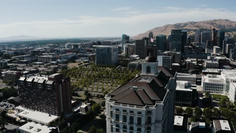 Aerial-view-flying-past-the-Grand-American-Hotel-in-Salt-Lake-City,-Utah