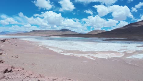 Piedras-Rojas-with-Salt-Flats-near-San-Pedro-de-Atacama-in-Chile,-South-America
