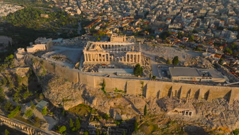 Circling-pan-up-aerial-shot-from-the-Acropolis-towards-central-Athens-city