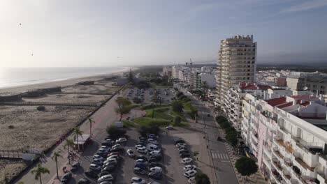 Montegordo-Seaside-Promenade-and-Parking,-Portugal---Aerial-flyover