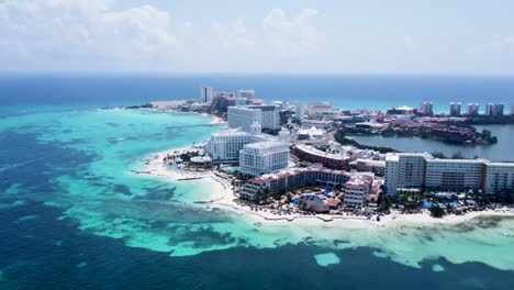 Stunning-aerial-view-of-Cancun-luxury-hotel-zone-with-blue-Caribbean-sea-and-white-beach,-Mexico