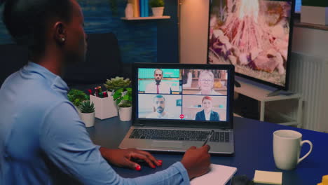 Remote-black-employee-having-video-conference-working-from-home