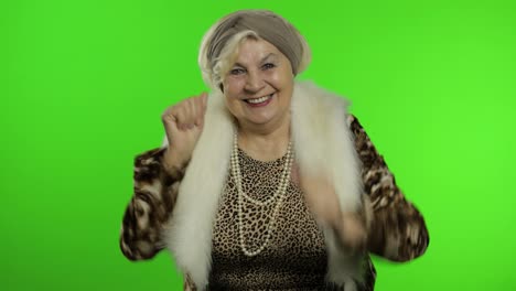 Elderly-stylish-grandmother.-Caucasian-woman-dancing,-celebrate.-Chroma-key