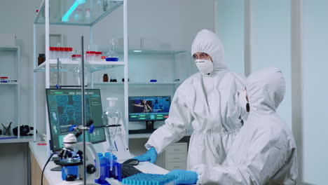 Biotechnology-scientist-wearing-ppe-suit-researching