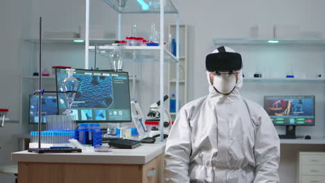 Scientist-researcher-in-protection-suit-using-VR