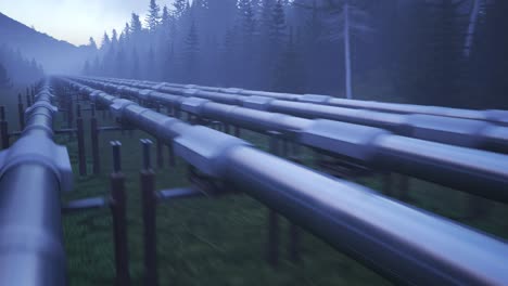Five-streams-of-pipeline-running-through-the-forest-clearance.-Metal-tubes-transport-oil-or-gas-over-long-distances.-Heavy-steel-pipes-supply-fuel.-Industrial-or-petrochemical-concept.