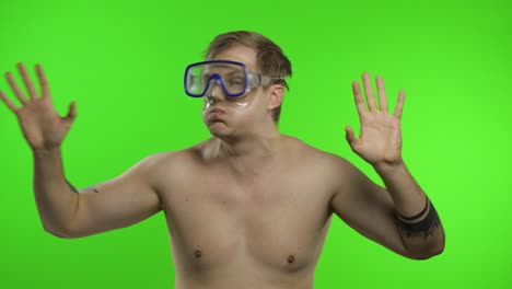 Emotional-shirtless-man-tourist-in-underwater-mask-on-chroma-key-background