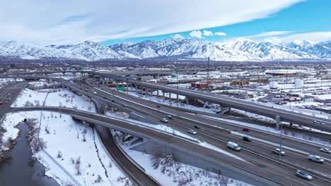 Traffic-flow-at-Spaghetti-Bowl-Interchange-in-Salt-Lake-City,-winter-aerial-view