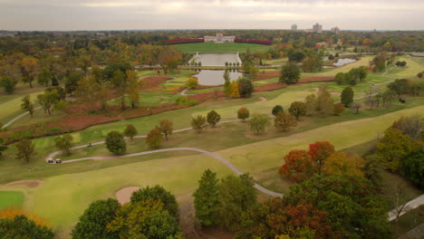 Aerial-of-Forest-Park-with-golf-course-and-the-Saint-Louis-Art-Museum-on-the-horizon-with-a-pan-towards-Lindell-and-the-History-Museum-and-Central-West-End-skyline-on-the-horizon