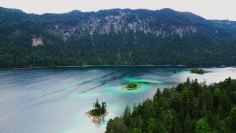 Scenic-blue-lake-with-mountains-in-background,-Lake-Eibsee-in-Bavarian-Alps,-Germany