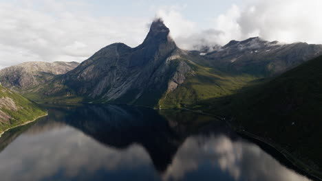 Epic-reflection-in-Tysfjord-of-iconic-Stetind-mountain,-Norway-National-Mountain