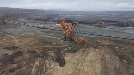 Aerial-view-of-enormous-bucket-wheel-excavator-in-surface-mining-operation