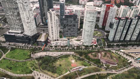 Aerial-view-of-the-surroundings-of-Parque-La-Mexicana-in-Santa-Fe,-Mexico-City