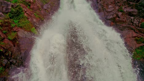 Close-up,-aerial-view-of-the-Bijagual-Waterfalls-in-Costa-Rica,-Central-America