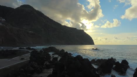 Porto-Moniz-in-Madeira-Potrugal-fottage-with-drone-of-cliffs-and-ocean-filmed-at-sunset