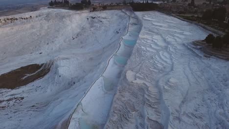 World-Wonder-Pammukale-travertine-mineral-terraces-and-light-blue-pools-as-seen-from-above-during-early-morning-sunrise