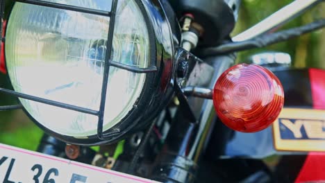 vintage-motorcycle-headlight-,-motorcycle-indicator-round-shape-,-sliding-video-shot-,-motorcycle-headlight-grill