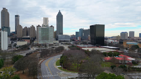 Drone-wide-shot-showing-skyline-of-Atlanta-City-with-Bank-of-America-Plaza-and-tower-buildings