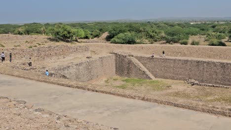 Wide-shot,-Dholavira-Archeology-Heritage-Site,-people-watching-the-legacy-of-a-5000-year-old-civilization