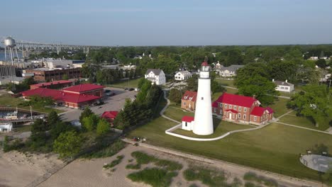 Aerial-view-of-Fort-Gratiot-Lighthouse,-Port-Huron,-Michigan,-USA,-on-the-shore-of-Lake-Huron