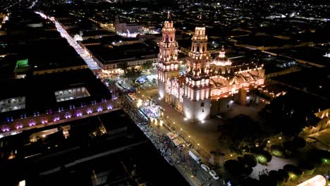 Morelia-Cathedral-in-the-historic-center,-Christmas-time-at-night-with-drone
