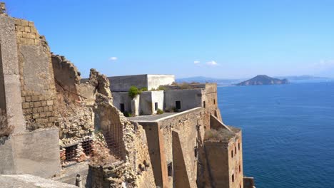Ancient-constructions-of-the-island-of-Procida---Terra-Murata-with-the-blue-sea-in-the-background