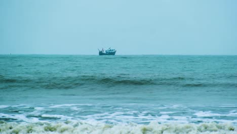 Fishing-Trawler-Navigating-In-The-Ocean-At-High-Tide-With-Waves-Splashing-In-Foreground