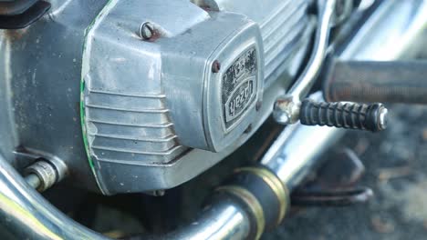 Sliding-shot-of-old-motorbike-engine-,-Old-style-brake-lever-,-Indian-vintage-motorcycle