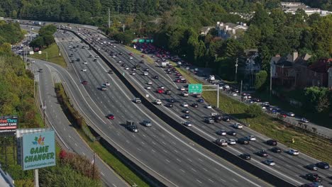 Aerial-view-busy-american-Highway-during-sunny-day-in-suburb-area-of-Atlanta-City