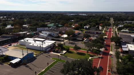Aerial-orbit-around-empty-parking-lots-of-historic-downtown-Clermont-Florida