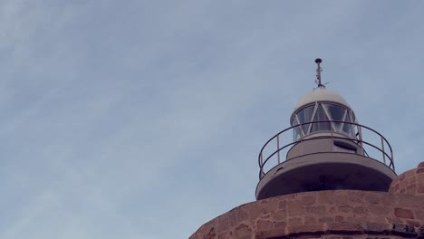 Time-lapse-of-Faro-de-Camarinal,-time-tested-16th-century-lighthouse-constructed-on-a-beacon-tower-with-a-spiral-staircase-and-views