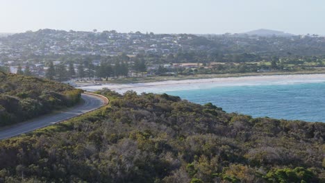 Scenic-road-passing-around-the-mountain-in-coastal-Australia-town
