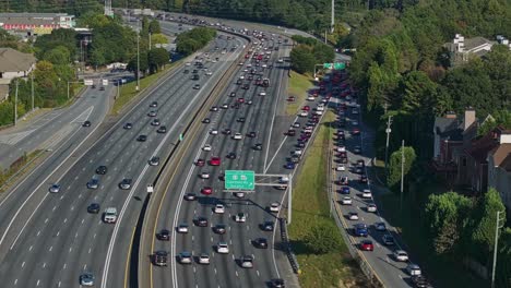 Aerial-view-showing-traffic-on-multi-lane-highway-in-Atlanta-City-during-sunny-day
