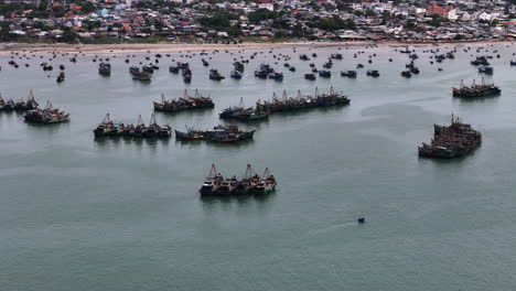 Fishing-Trawler-Boats-Anchored-at-Southeast-Asian-Coastal-Waters,-Aerial