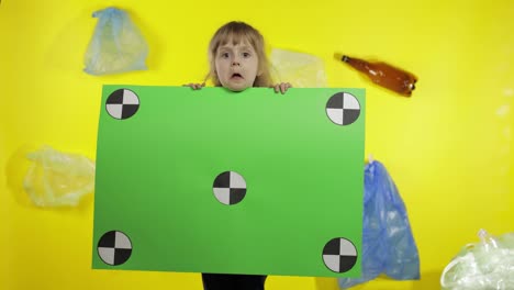 Girl-activist-holding-chroma-key-poster-with-tracking-points.-Environment-trash-plastic-pollution