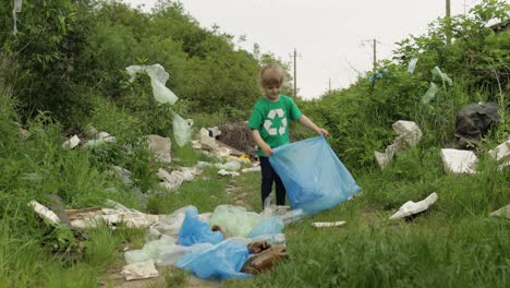 Volunteer-girl-cleaning-up-dirty-park-from-plastic-bags,-bottles.-Reduce-trash-nature-pollution