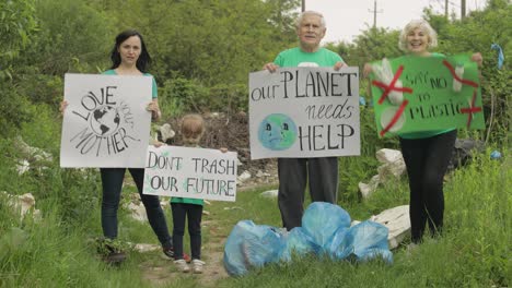 Volunteer-team-holding-encouraging-posters.-Calls-out-slogans.-Reduce-trash-cellophane-pollution