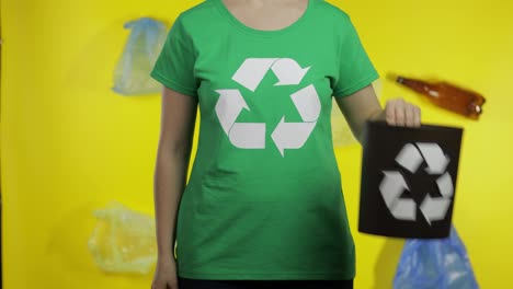 Unrecognizable-woman-put-cellophane-package-in-bin-dump.-Save-ecology.-Plastic-nature-pollution