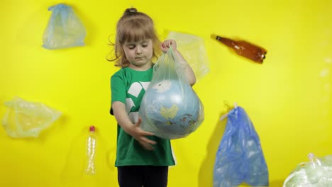 Girl-activist-makes-Earth-globe-free-from-plastic-package.-Reduce-trash-pollution.-Save-ecology