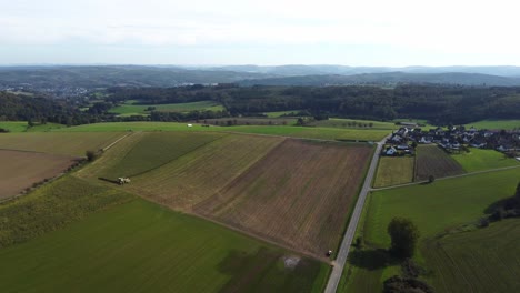 Aerial-drone-shot-of-a-corn-harvest