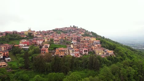 Aerial-toward-Rocca-Priora-village-surrounding-a-castle-on-a-hilltop