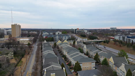 Panorama-shot-of-american-neighborhood-with-road-and-football-field-in-Atlanta-City,-Georgia