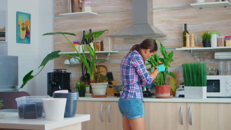 Lady-gardening-in-the-kitchen-at-home