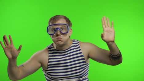 Emotional-man-tourist-in-underwater-mask,-striped-sailor-shirt-on-chroma-key