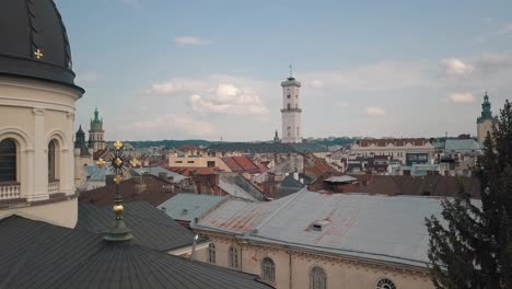 Aerial-drone-video-of-european-city-Lviv,-Ukraine.-Rynok-Square,-Central-Town-Hall,-Dominican-Church
