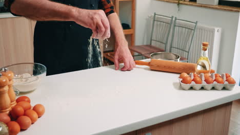 Making-dough-by-man-hands-at-home