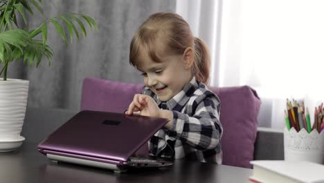 Girl-studying-online-lessons-using-digital-laptop-computer.-Distance-education
