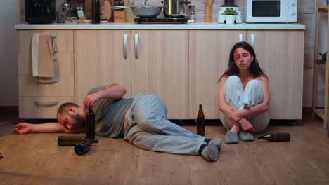 Alcoholic-man-lying-on-the-floor